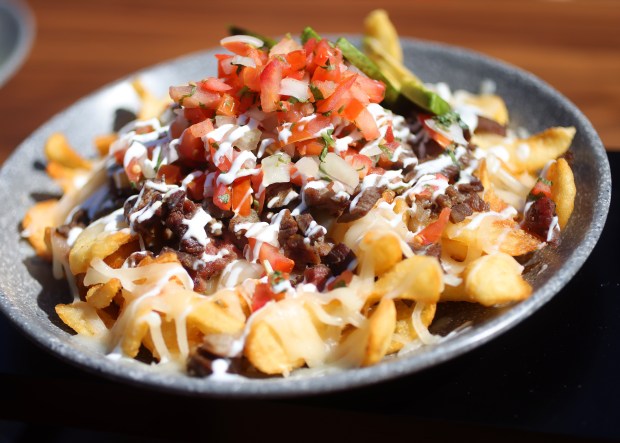 Araujo's Asada Fries at the 2025 Levi's Stadium Concessions Showcase on Wednesday, Sept. 17, 2025, in Santa Clara, Calif. The dish consists of carne asada, cheese, pico de Gallo, sour cream, and avocado. (Aric Crabb/Bay Area News Group)