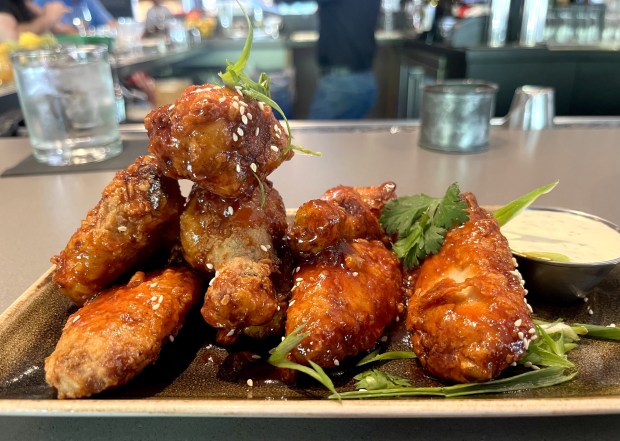 The "KFC" Korean Fried Chicken wings with apricot glaze and herbed dipping sauce at Social Bird in Lafayette, Calif. (John Metcalfe/Bay Area News Group)