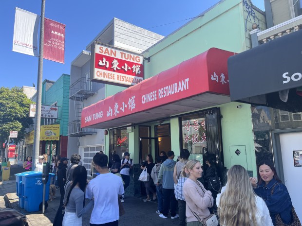 At San Tung in San Francisco, the original dry fried chicken wings are fried in batter with garlic, ginger and roasted red peppers, then tossed in a sweet chili sauce (photo by Jason Mastrodonato/Bay Area News Group).