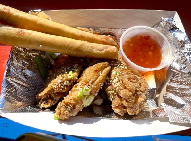 The chicken wings with lumpia and dipping sauce at Lucky Three Seven in Oakland, Calif. (John Metcalfe/Bay Area News Group)