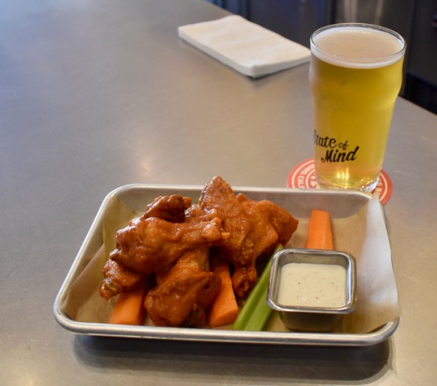 Buffalo wings are among the types of chicken wings available on the menu at State of Mind Public House and Pizzeria in Redwood City. (Kate Bradshaw/Bay Area News Group)