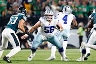 Dallas Cowboys center Cooper Beebe (56) drops back to block Philadelphia Eagles linebacker...