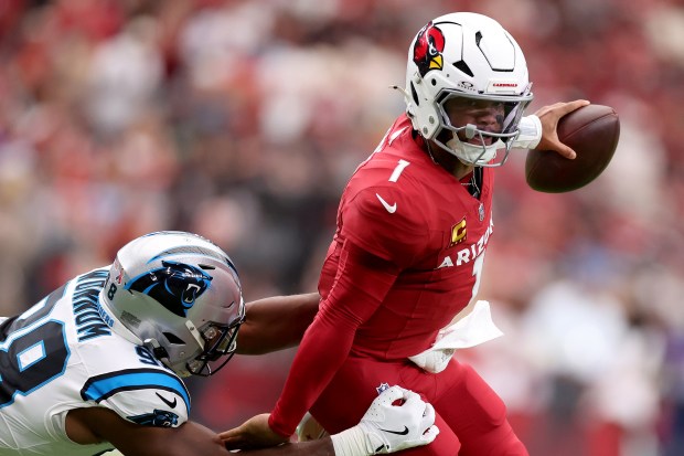 Kyler Murray #1 of the Arizona Cardinals is sacked by D.J. Wonnum #98 of the Carolina Panthers at State Farm Stadium on Sept. 14, 2025 in Glendale, Arizona. (Photo by Chris Coduto/Getty Images)