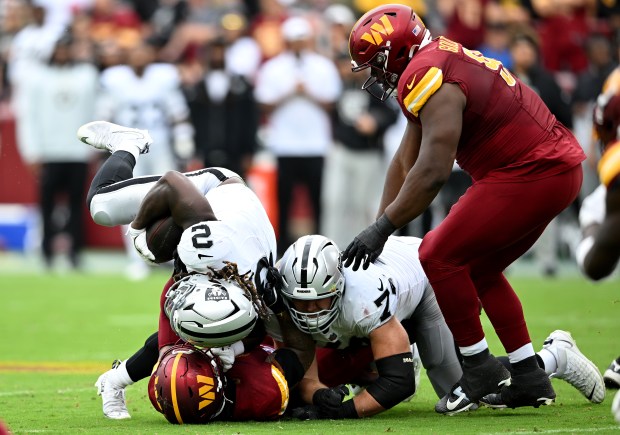 Ashton Jeanty #2 of the Las Vegas Raiders tackled during the second quarter against the Washington Commanders at Northwest Stadium on Sept. 21, 2025 in Landover, Maryland. (Photo by Greg Fiume/Getty Images)