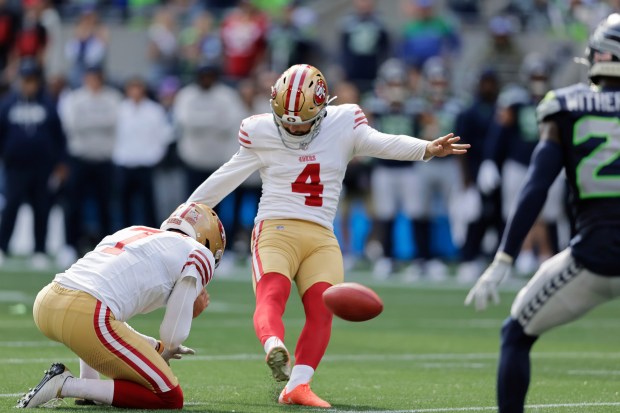 San Francisco 49ers place-kicker Jake Moody (4) kicks a field goal attempt that was blocked by Seattle Seahawks during the second half of an NFL football game Sunday, Sept. 7, 2025, in Seattle. (AP Photo/John Froschauer)