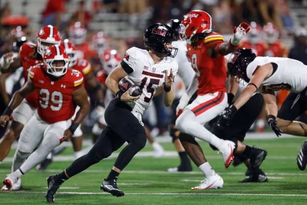 Northern Illinois quarterback Josh Holst (15) in action during an NCAA football game against Maryland on Friday, Sept. 5, 2025, in College Park, Md. Maryland won 20-9. (AP Photo/Mike Buscher)