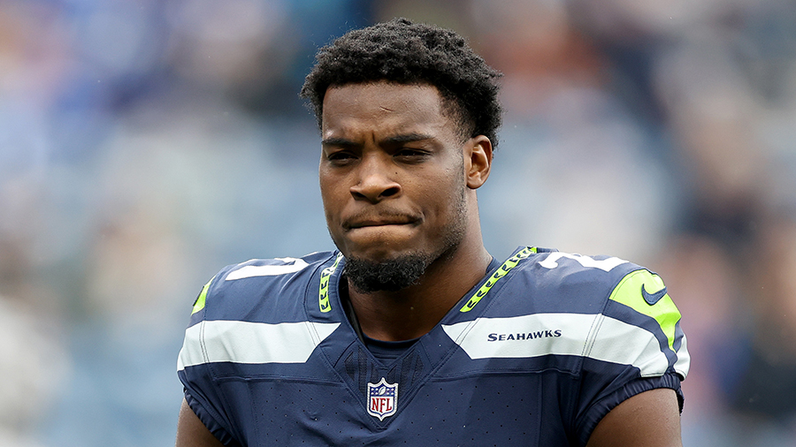 Seattle Seahawks Devon Witherspoon looks on 2024...