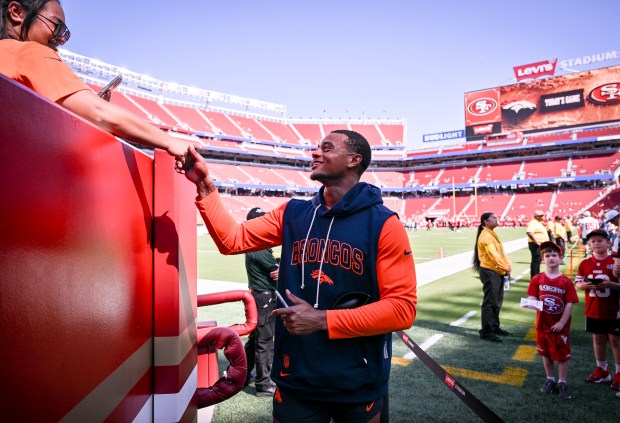 Pat Surtain II (2) of the Denver Broncos greets fans before a preseason game against the San Francisco 49ers at Levi's Stadium in Santa Clara, California, on Saturday, Aug. 9, 2025. (Photo by AAron Ontiveroz/The Denver Post)