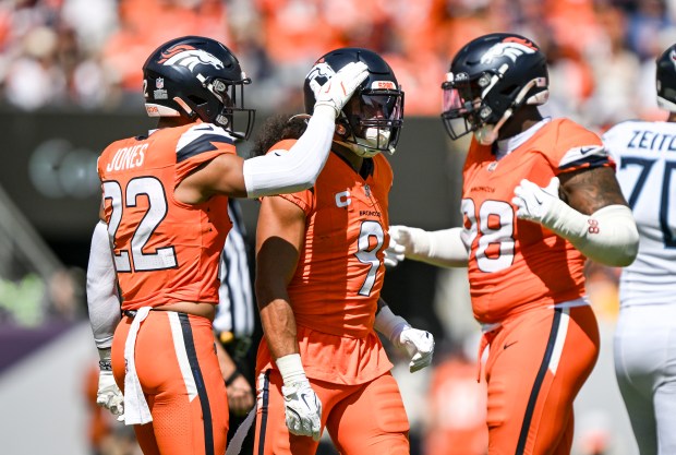 Talanoa Hufanga (9) of the Denver Broncos celebrates a tackle...