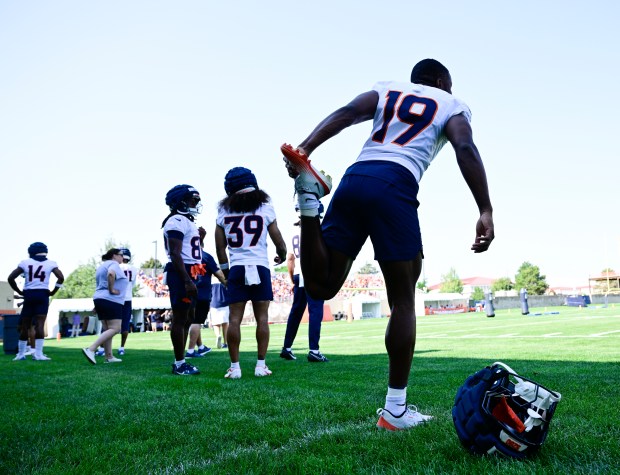 Denver Broncos wide receiver Marvin Mims Jr. (19) stretches during training camp at Broncos Park Powered by CommonSpirit in Centennial on Friday, July 25, 2025. (Photo by Andy Cross/The Denver Post)