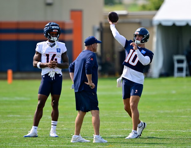 Denver Broncos head coach Sean Payton talks to Denver Broncos wide receiver Courtland Sutton (14) and QB Bo Nix (10) during training camp at Broncos Park Powered by CommonSpirit in Centennial on Thursday, July 31, 2025. (Photo by Andy Cross/The Denver Post)