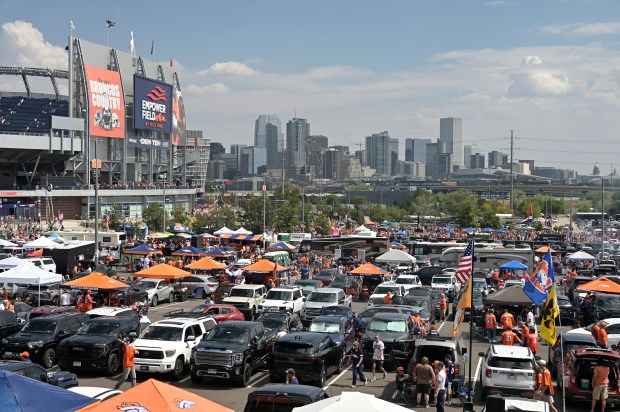 Denver Broncos fans tailgate at Empower Field at Mile High...