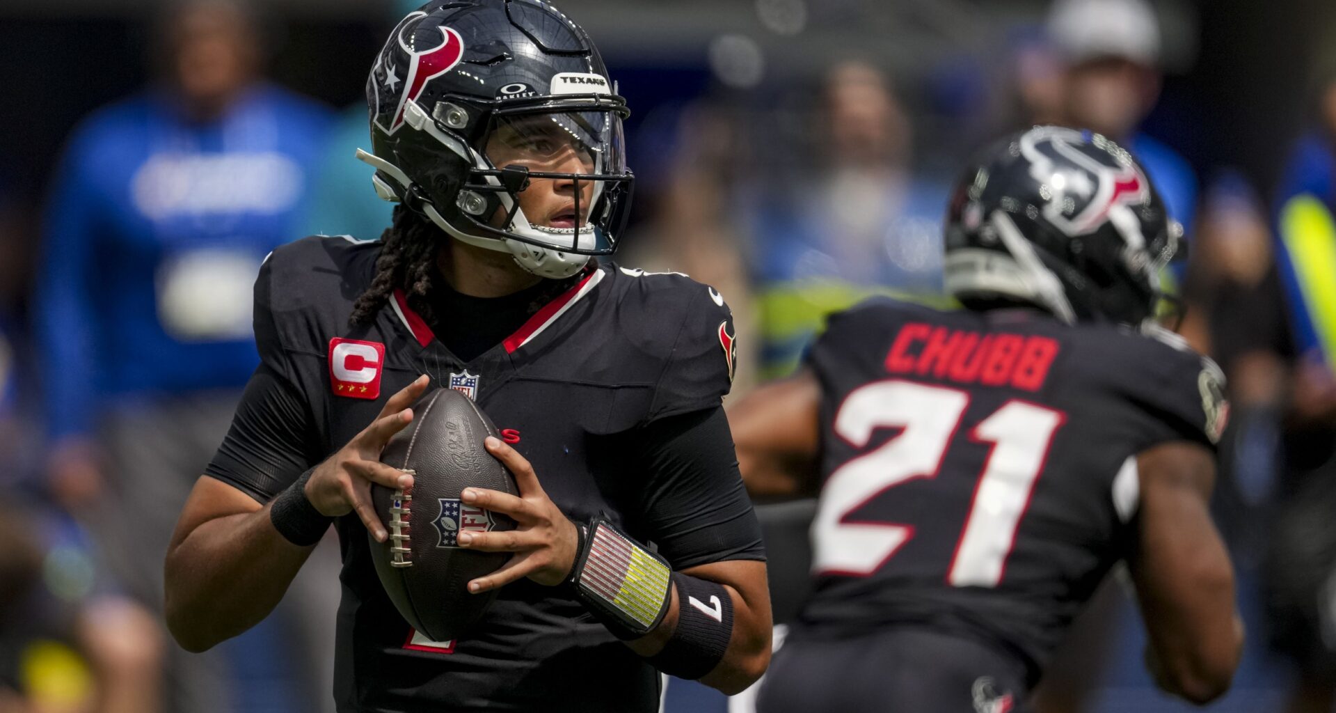 Texans quarterback C.J. Stroud looks to throw against the Rams during the 2025 NFL season.