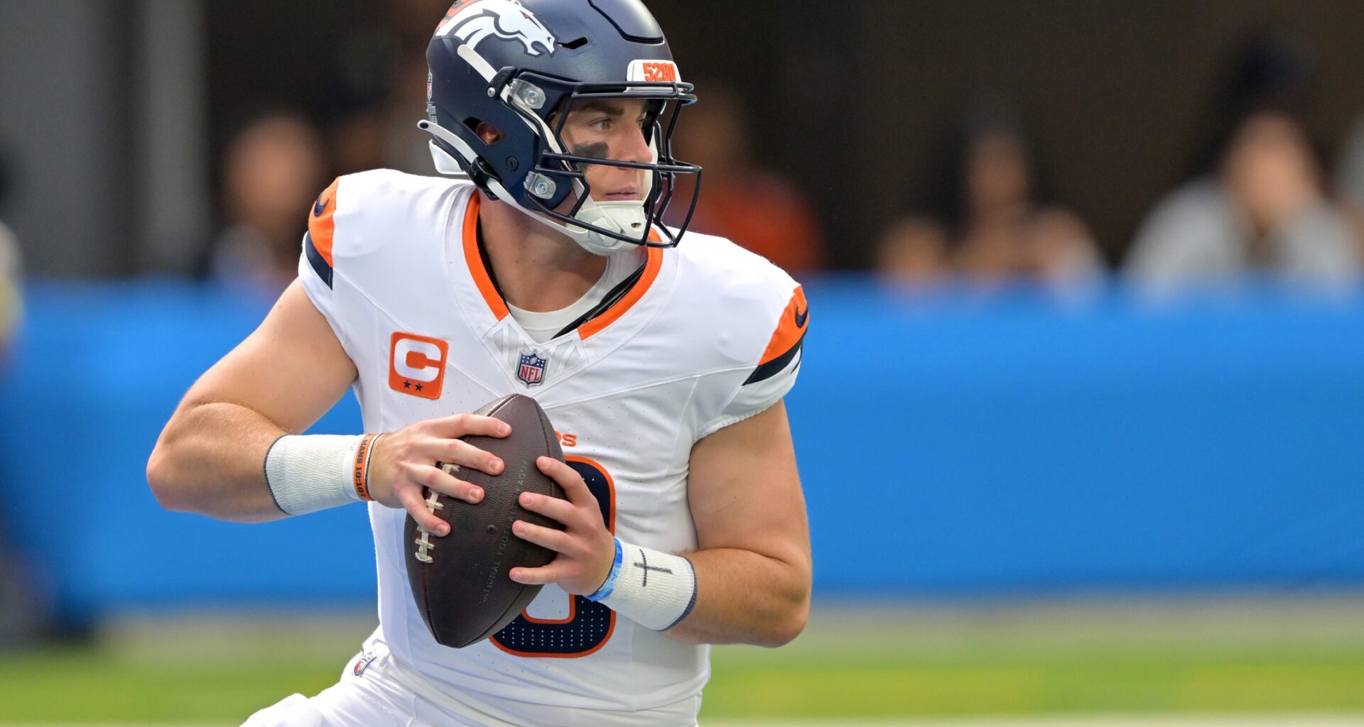Broncos quarterback Bo Nix looks to throw against the Chargers during the 2025 season.