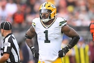 Green Bay Packers linebacker Micah Parsons (1) stands on the field during an NFL football...