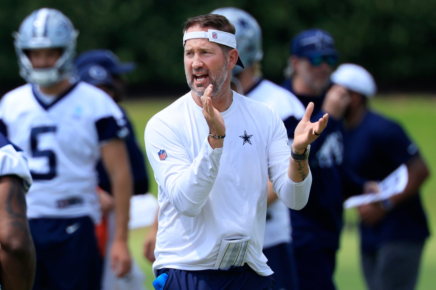 Dallas Cowboys head coach Brian Schottenheimer gets his squad fired up during their final...