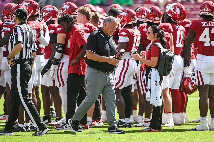 Arkansas coach Sam Pittman talks to his team during a time out against Notre Dame during an...