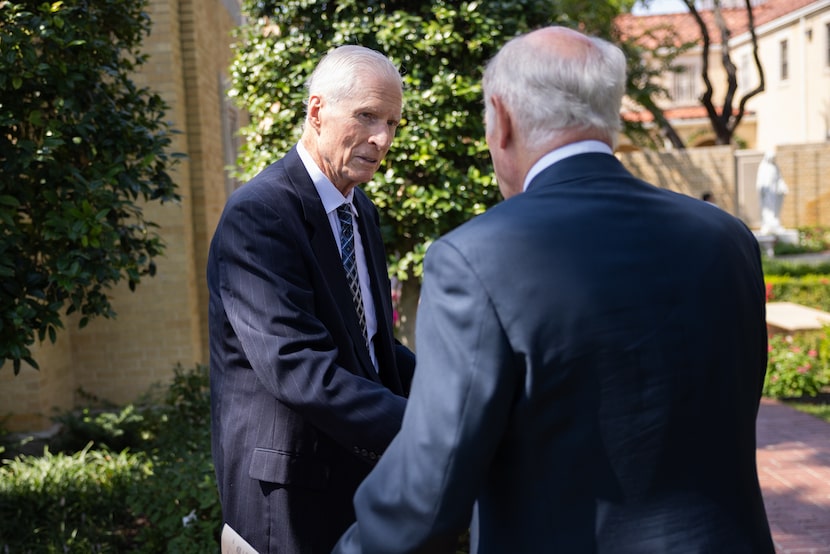 Former Dallas Cowboys defensive back Bob Lilly chats after the funeral mass for former...