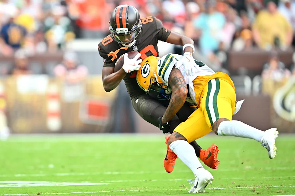 CLEVELAND, OHIO - SEPTEMBER 21: Keisean Nixon #25 of the Green Bay Packers tackles Jamari Thrash #80 of the Cleveland Browns during the second quarter at Huntington Bank Field on September 21, 2025 in Cleveland, Ohio. (Photo by Jason Miller/Getty Images)