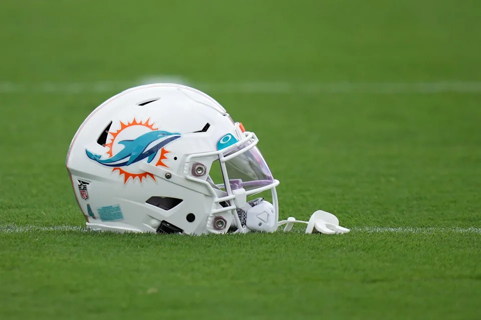 Aug 3, 2022; Miami Gardens, Florida, US; A general view of a Miami Dolphins helmet on the field during training camp at Baptist Health Training Complex. Mandatory Credit: Jasen Vinlove-USA TODAY Sports