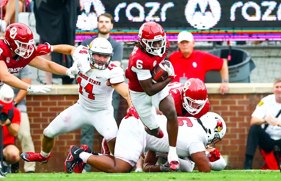 Oklahoma running back Tory Blaylock (6) runs past Illinois State linebacker Mason Kaplan (14) during the second half at Gaylord Family-Oklahoma Memorial Stadium.
