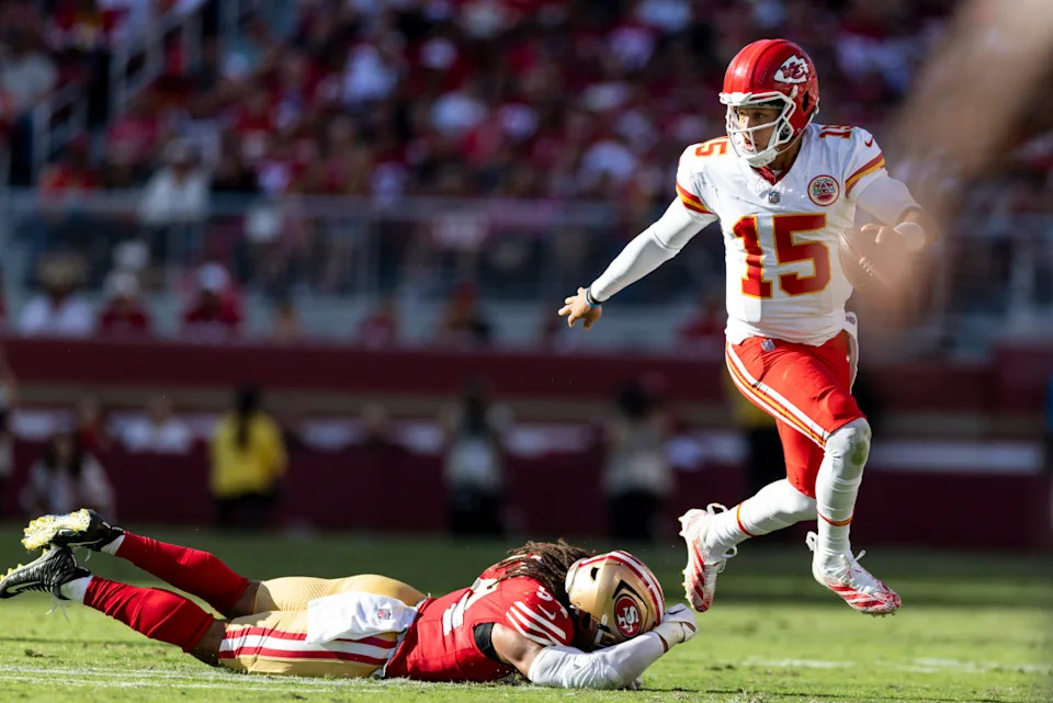 SANTA CLARA, CALIFORNIA - OCTOBER 20: Patrick Mahomes #15 of the Kansas City scrambles and runs with the ball against Fred Warner #54 of the San Francisco during an NFL Football game at Levi's Stadium on October 20, 2024 in Santa Clara, California. (Photo by Michael Owens/Getty Images)Michael Owens&sol;Getty Images