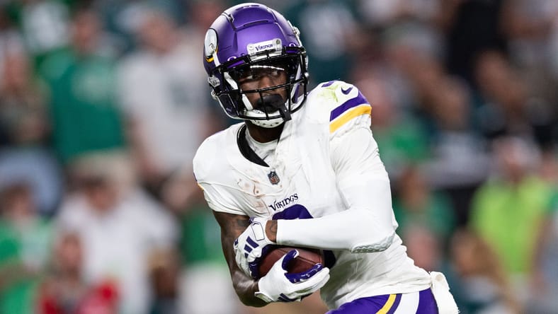 Jordan Addison running down the sideline for a touchdown against the Eagles at Lincoln Financial Field. Jordan Addison Vikings contract. 