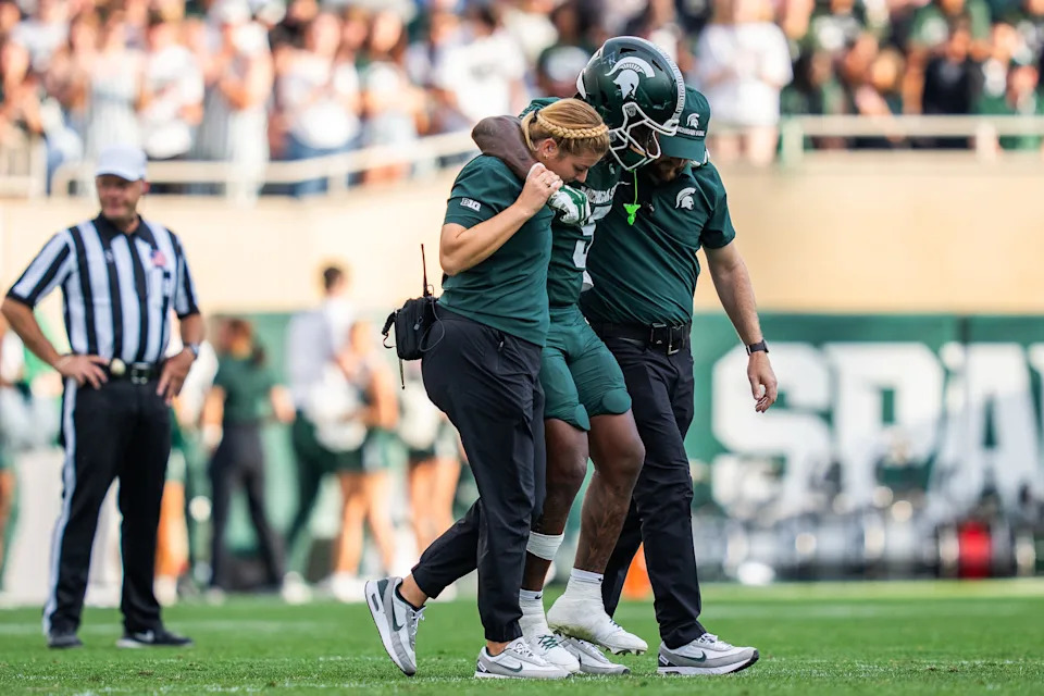 Michigan State running back Makhi Frazier (5) is helped off the field during a game against Youngstown State at Spartan Stadium in East Lansing on Saturday, September 13, 2025.