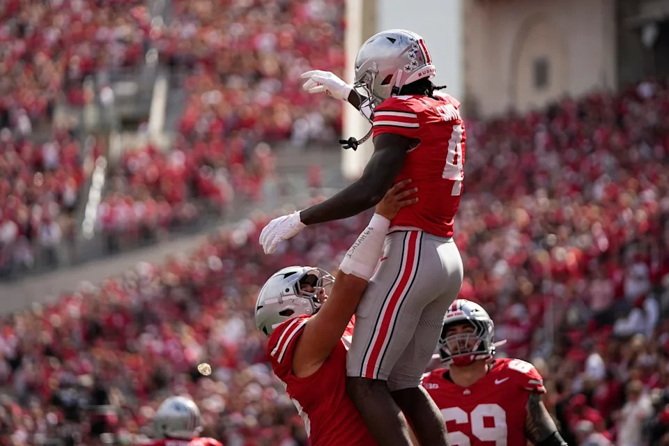 Ohio State Buckeyes wide receiver Jeremiah Smith (4) celebrates an 87-yard touchdown catch during the first half of the NCAA football game against Grambling State at Ohio Stadium on Sept. 6, 2025.