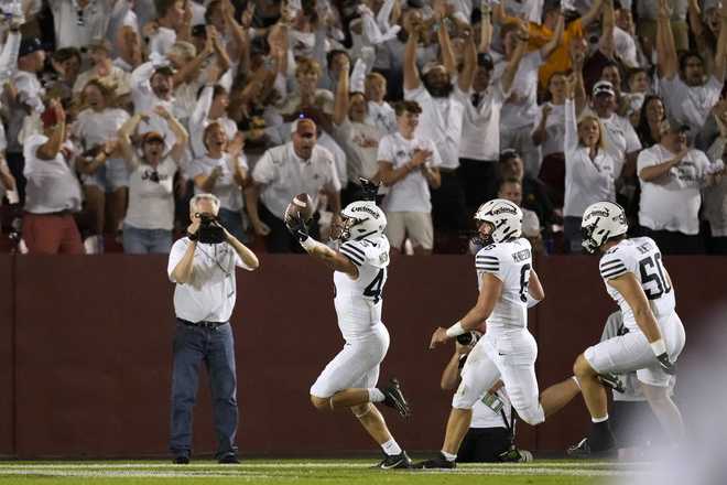 Iowa State defensive back Caden Matson (43) celebrates after scoring a touchdown on a blocked punt during the first half of an NCAA college football game against Baylor, Saturday, Oct. 5, 2024, in Ames, Iowa. (AP Photo/Charlie Neibergall)
