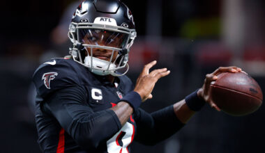 Atlanta Falcons quarterback #9, Michael Penix Jr. holding a football.