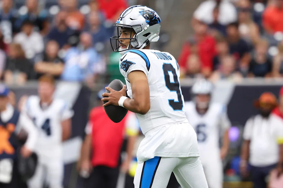 Aug 16, 2025; Houston, Texas, USA; Carolina Panthers quarterback Bryce Young (9) looks for an open receiver during the first quarter against the Houston Texans at NRG Stadium. Mandatory Credit: Troy Taormina-Imagn Images