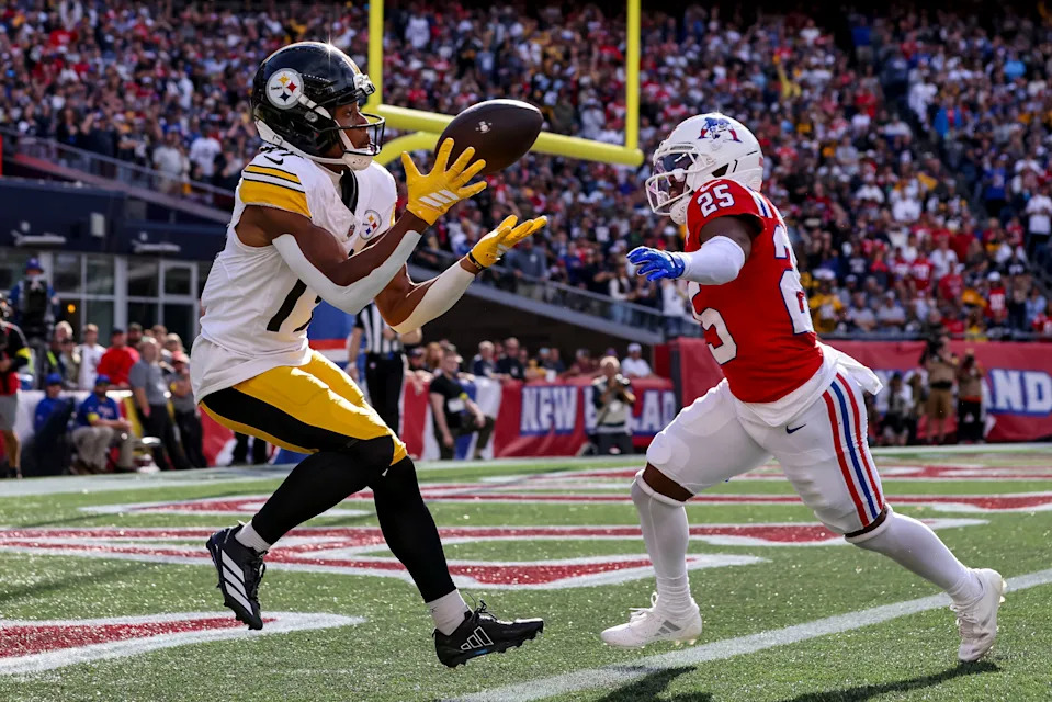 Sep 21, 2025; Foxborough, Massachusetts, USA; Pittsburgh Steelers wide receiver Calvin Austin III (19) scores the winning touchdown during the fourth quarter at Gillette Stadium. Mandatory Credit: Paul Rutherford-Imagn Images