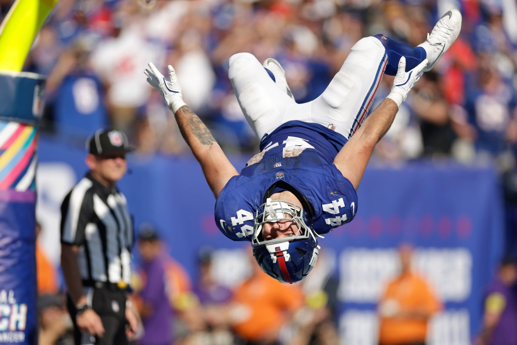 Cam Skattebo celebrates after scoring a touchdown during the Giants-Chargers game on Sept. 28, 2025. 