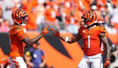 Cincinnati Bengals wide receiver Tee Higgins, left, celebrates his touchdown catch with wide receiver Ja'Marr Chase (1) during the second half of an NFL football game against the Jacksonville Jaguars, Sunday, Sept. 14, 2025, in Cincinnati. (AP Photo/Jeff Dean)