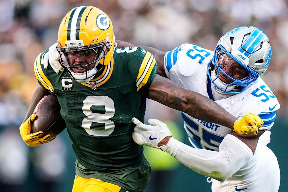 Detroit Lions linebacker Derrick Barnes (55) tackles Green Bay Packers running back Josh Jacobs (8) during the second half at Lambeau Field in Green Bay, Wis., on Sunday, September 7, 2025.