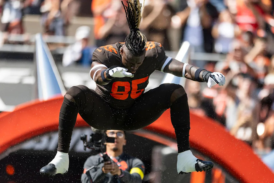 Sep 21, 2025; Cleveland, Ohio, USA; Cleveland Browns tight end David Njoku (85) leaps onto the field during player introductions before the game against the Green Bay Packers at Huntington Bank Field. Mandatory Credit: Scott Galvin-Imagn Images