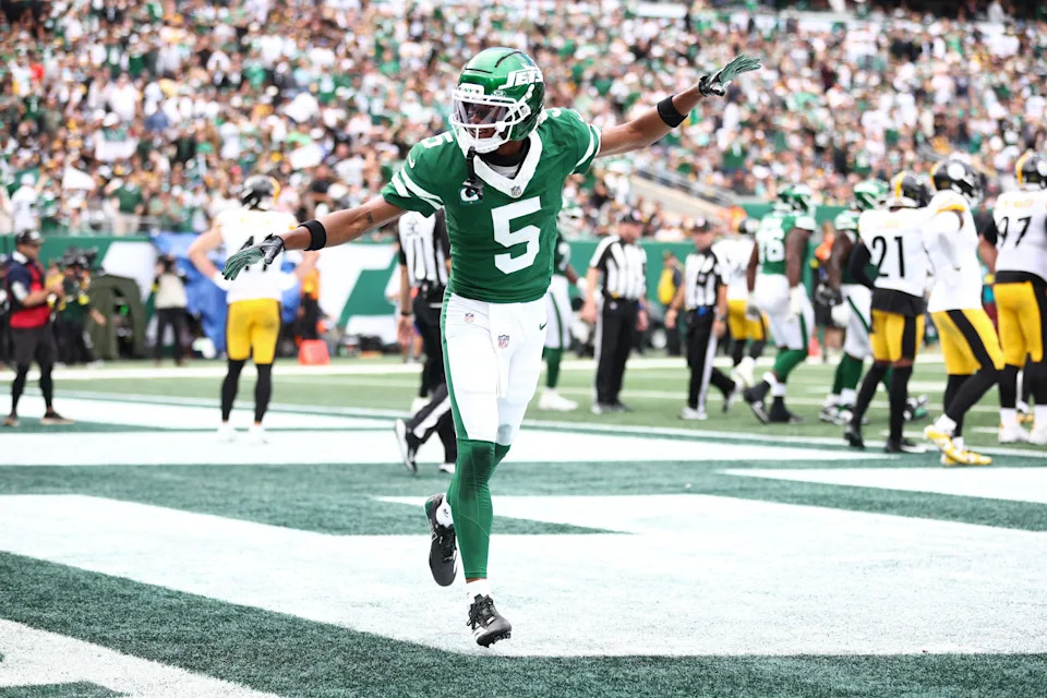 Sep 7, 2025; East Rutherford, New Jersey, USA; New York Jets wide receiver Garrett Wilson (5) celebrates during the second half against the Pittsburgh Steelers at MetLife Stadium. Mandatory Credit: Wendell Cruz-Imagn Images