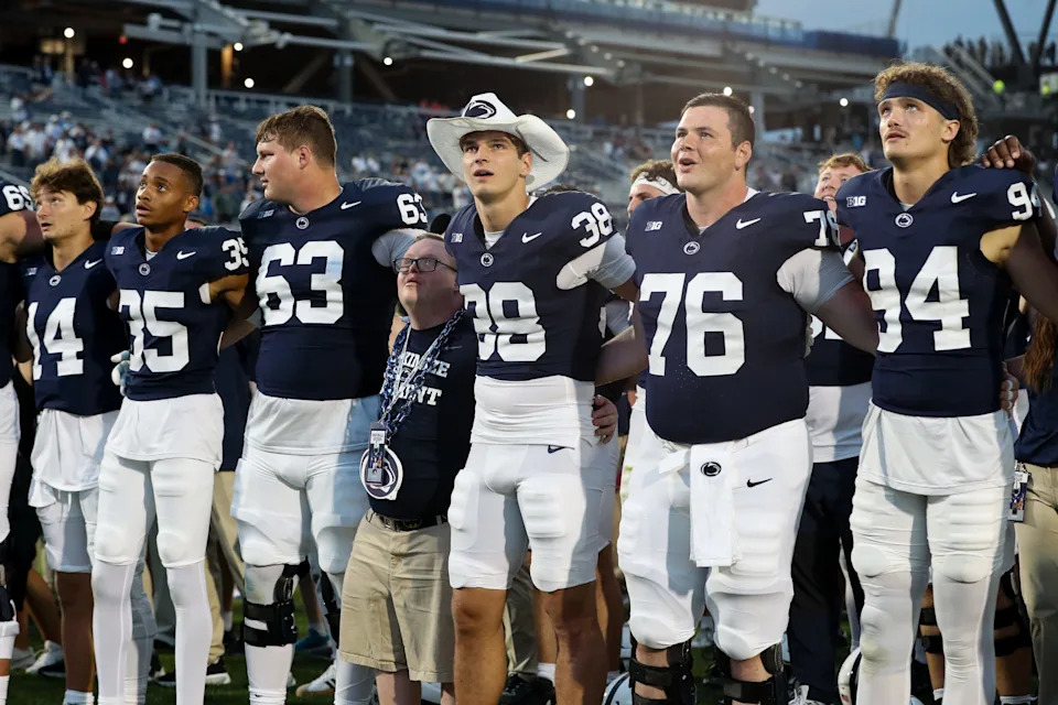 Sep 13, 2025; University Park, Pennsylvania, USA; Penn State Nittany Lion players sing their alma mater following the end of the game against the Villanova Wildcats at Beaver Stadium. Mandatory Credit: Matthew O'Haren-Imagn Images