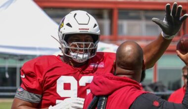 Cardinals captain Calais Campbell runs through practice drills...