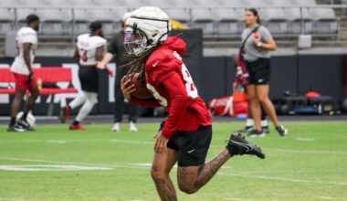 Xavier Weaver takes back a return during Cardinals practice...