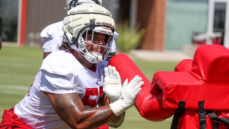 Cardinals' Dante Stills gets to work during practice...