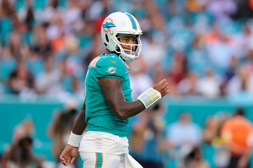 Aug 23, 2025; Miami Gardens, Florida, USA; Miami Dolphins quarterback Tua Tagovailoa (1) looks on against the Jacksonville Jaguars during the first quarter at Hard Rock Stadium. Mandatory Credit: Sam Navarro-Imagn Images