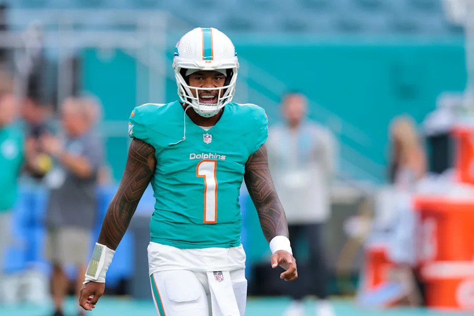 Aug 23, 2025; Miami Gardens, Florida, USA; Miami Dolphins quarterback Tua Tagovailoa (1) reacts before the game against the Jacksonville Jaguars at Hard Rock Stadium. Mandatory Credit: Sam Navarro-Imagn Images