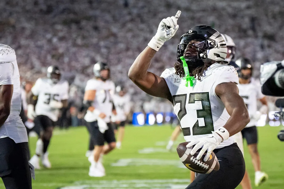 Oregon running back Dierre Hill Jr. celebrates a touchdown as the Oregon Ducks face the Penn State Nittany Lions on Sept. 27, 2025, at Beaver Stadium in University Park, Pennsylvania.