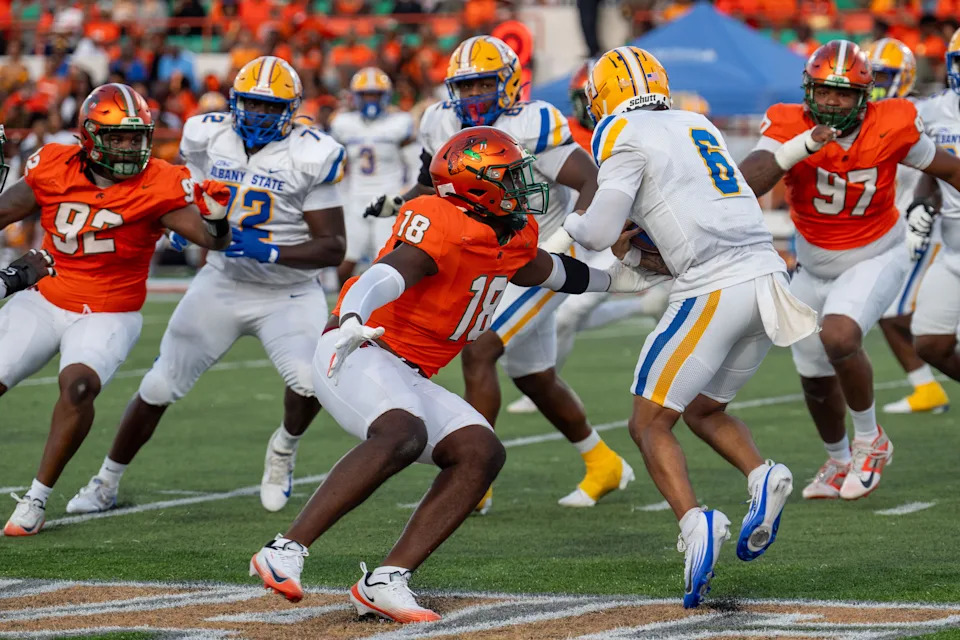 Florida A&M Rattlers defensive end Antonio Camon (18) tries to tackle an opponent. The Florida A&M Rattlers defeated the Albany State Golden Rams during the first home game of the season on Saturday, Sept. 13, 2025. Alicia Devine/Tallahassee Democrat