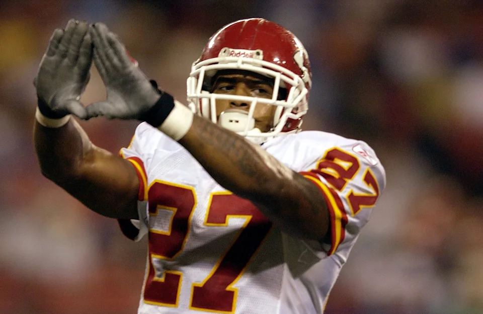 EAST RUTHERFORD - AUGUST 13: Larry Johnson #27 of the Kansas City Chiefs celebrates his touchdown against New York Giants on August 13, 2004 at Giants Stadium in the East Rutherford, New Jersey. (Photo by M. David Leeds/Getty Images)