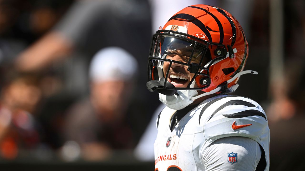 Cincinnati Bengals running back Chase Brown (30) celebrates his rushing touchdown during the first half of an NFL football game against the Cleveland Browns, Sunday, Sept. 7, 2025, in Cleveland. (AP Photo/David Richard)