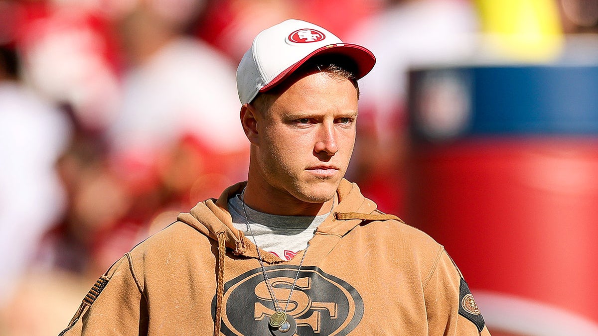 Christian McCaffrey looks on field