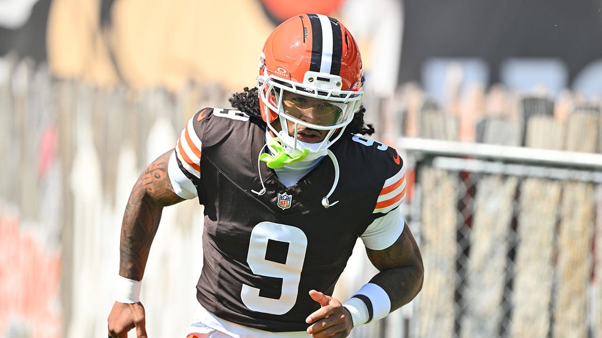 Grant Delpit jogs out of the tunnel